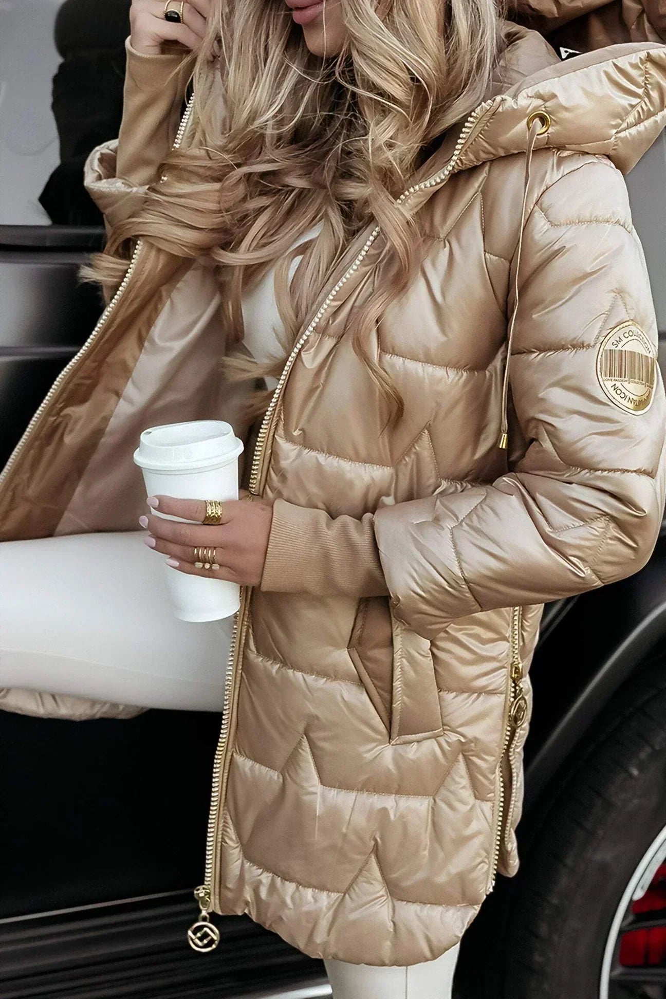 Lina | Giacca trapuntata lunga e calda con cappuccio ampio